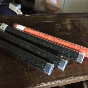 Miyuki tiny Delica glass beads 15/0 Black & orange tubes